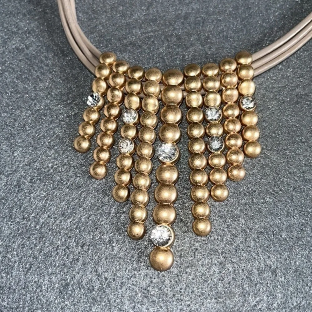 Dansk Smykkekunst gold with rhinestones and blush leather necklace